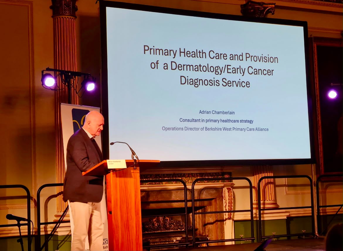 Adrian Chamberlain speaking at an NHS event on primary care and early cancer diagnosis services